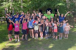 group of young campers standing in a group