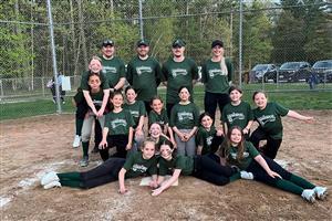 young female softball players posing as a group