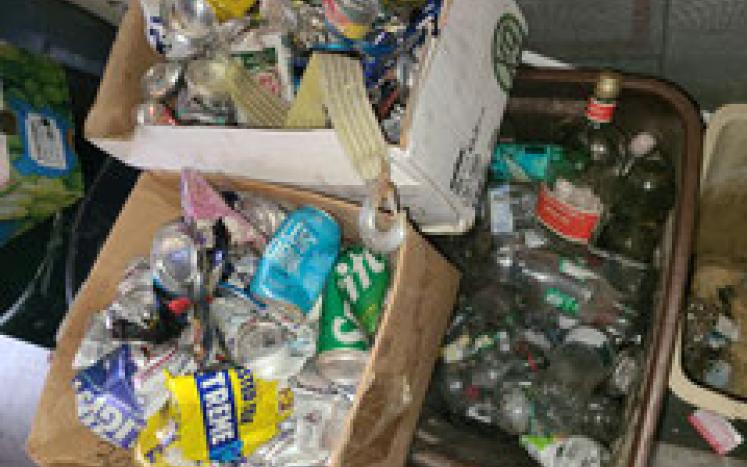 Trash collected in boxes and bins